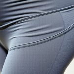 Close-up of the soft, high-quality fabric and stitching of active leggings with pockets, perfect for pregnancy and workouts.
