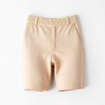 Beige no front seam bike shorts made from organic cotton, studio shot on white background.