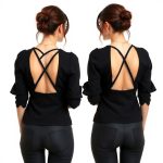 Back view of a model wearing the black cross top raspberry tea leaves, showcasing the fit from behind.