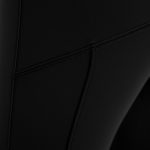 Close-up of the fabric texture and stitching on black leggings with pockets, straight leg yoga pants.