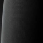 Close-up detail of black yoga pants flare leggings, showing the fabric texture and quality stitching.