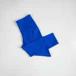 Royal Blue crop yoga pants, neatly folded on a clean surface.
