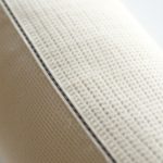 Close-up of premium Merino Wool fabric on flare leggings Australia flare workout pants, highlighting texture and stitching.