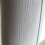 Close-up of soft Merino Wool fabric and stitching on high waisted yoga pants women flared workout pants, showcasing quality.