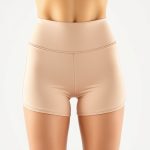 Beige high waisted yoga shorts, Australian activewear on white background.