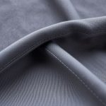 Close-up detail of the soft, breathable organic cotton yoga pants fabric and stitching.